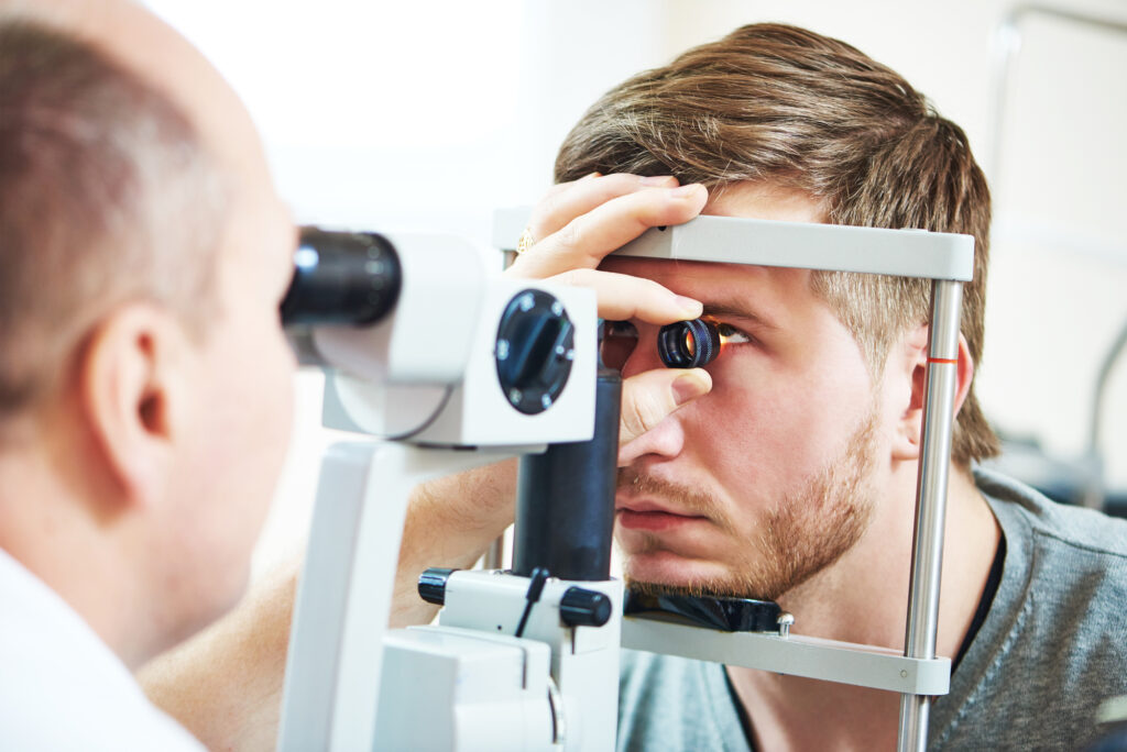 Young Caucasian man undergoing an eye exam